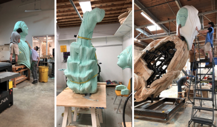 Staff and students work on sculpting the figurehead at STEAM Studio